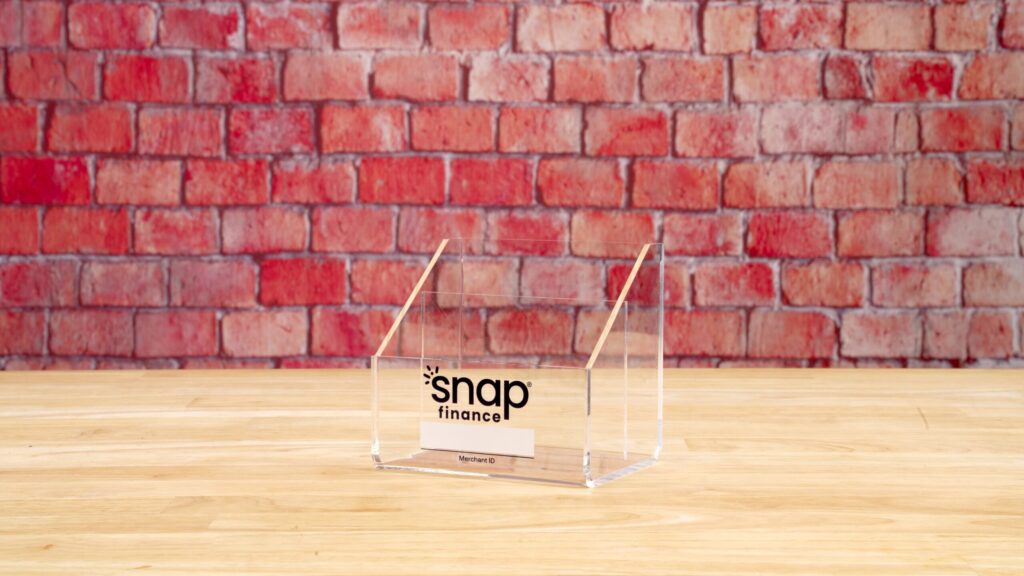 Snap Finance logo printed on a clear acrylic literature holder